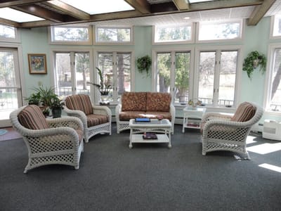 Bright common area with seating and natural light
