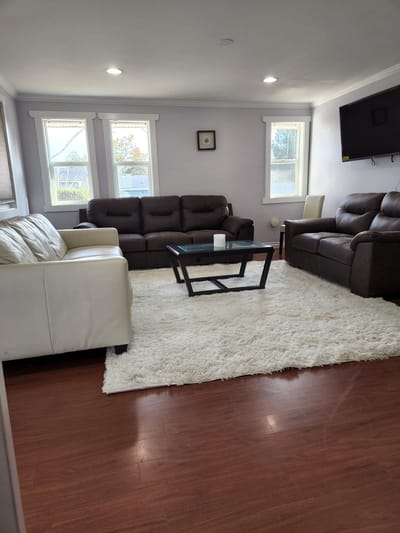Cozy common area with sofas and a coffee table