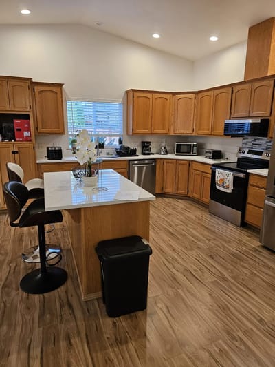 Bright kitchen area with modern cabinetry