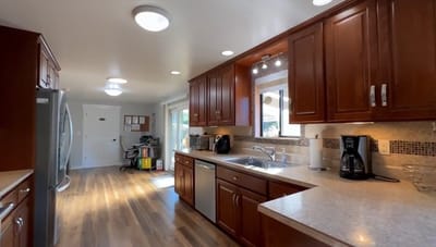 Bright kitchen interior with wooden cabinets