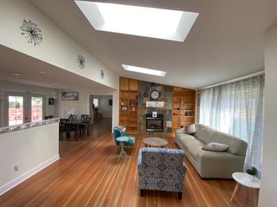 Bright common area with seating and decor
