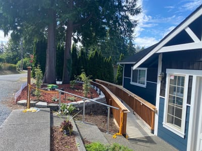 Outdoor view of the facility's entrance and gardens