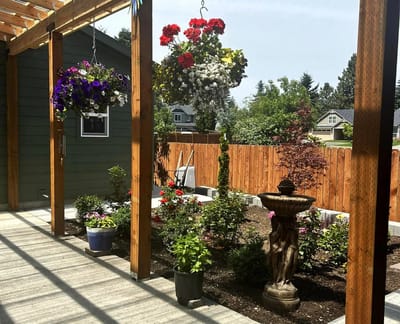 Beautiful outdoor garden space with flowers and a fountain