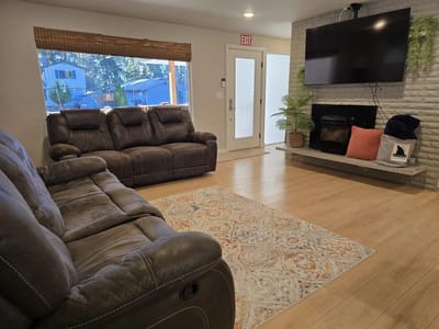 Cozy common area with seating and a TV