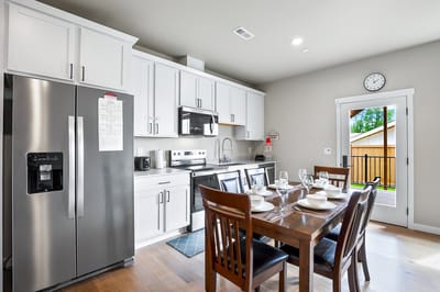 Bright interior view of a kitchen and dining area