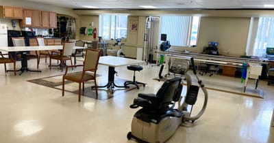 Rehabilitation facility interior with exercise equipment
