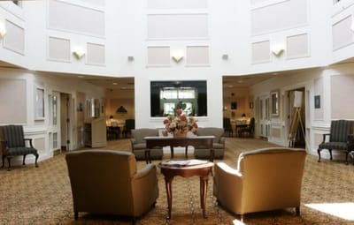 Interior common area with seating and floral arrangement