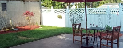 Outdoor seating area with table and chairs