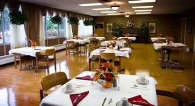 Dining room with tables set for a meal