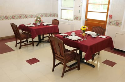 Nice dining setup with flowers and table settings