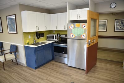 Interior kitchen space with appliances and decor
