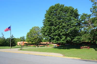 Exterior view of Slate Valley Center with landscaping