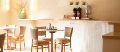 Bright dining room with elegant decor and seating