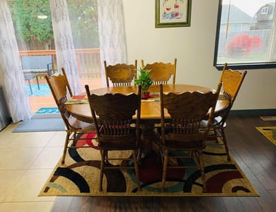 Dining area with a wooden table and chairs