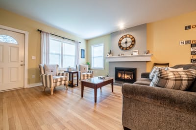 Cozy common area with seating and fireplace