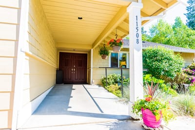 Entrance to Newcastle Gardens Senior Home with flowers