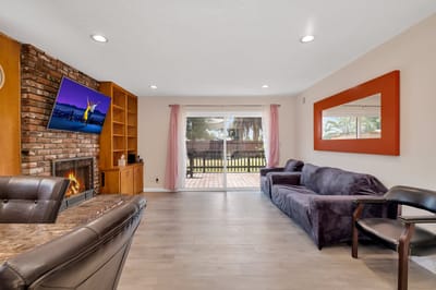 Interior view of a cozy common area with a fireplace
