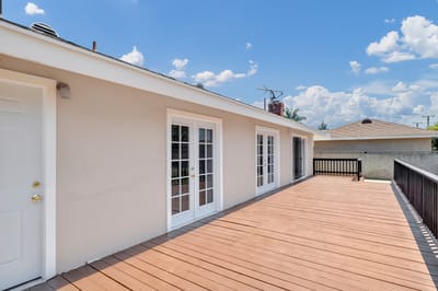 Exterior view of a facility with a wooden deck