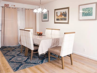 Interior dining area with a table and chairs