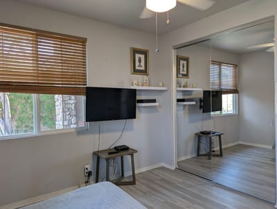Cozy resident room with a television and window