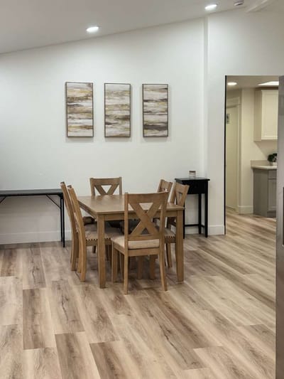 Bright and modern dining area with wooden furniture