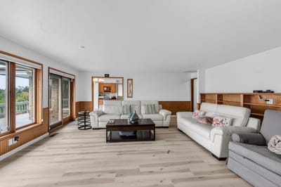 Bright common area with seating and windows