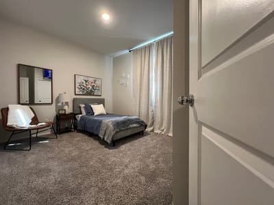 Well-furnished resident bedroom in an assisted living facility
