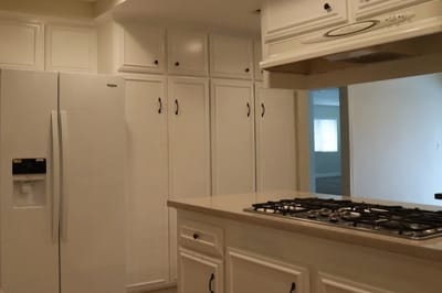 Interior view of a kitchen area with cabinetry