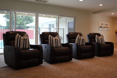 Reclining chairs arranged in a cozy common area
