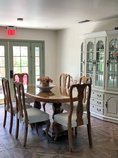Dining area with wooden table and chairs