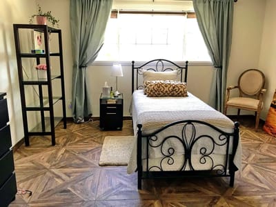 Brightly furnished private resident room