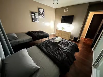 A well-furnished private resident room with two beds