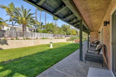 Outdoor space with seating and garden area