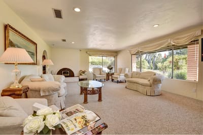 Bright common area with seating and natural light