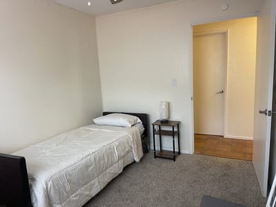 A simple private bedroom in the facility