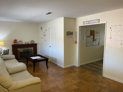 Bright common area with a seating arrangement and decor