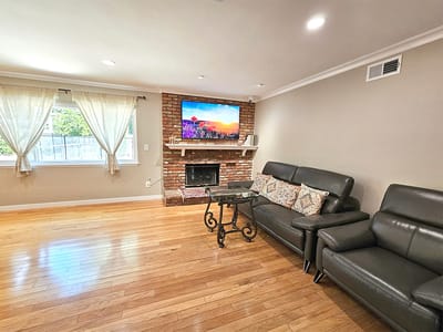 Cozy lounge area with modern furniture and a fireplace
