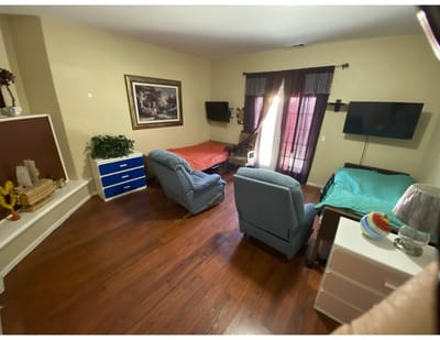 Interior view of a resident room with two beds