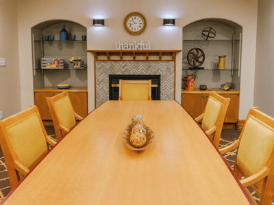 Dining area with wooden table and decorative accents
