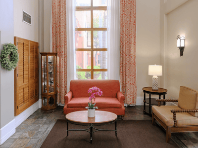 Bright common area with seating and decorative elements