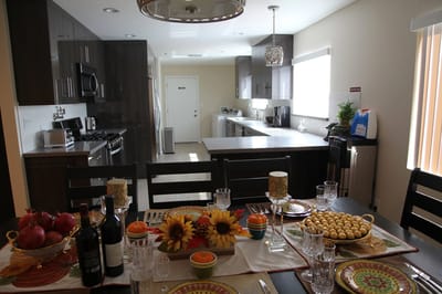 Dining room set with food and decorations