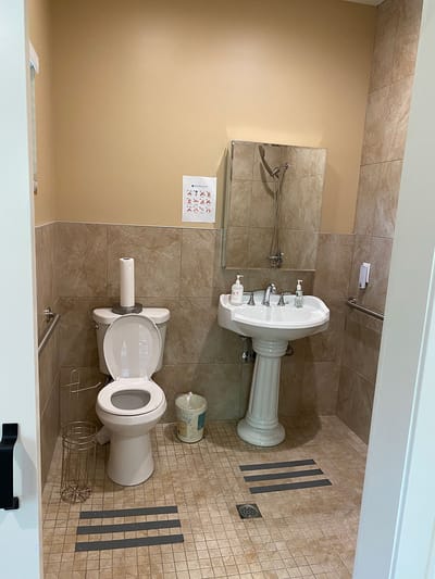 Accessible bathroom with toilet and sink