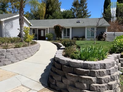Welcoming front entrance of the facility with landscaping