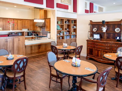 Dining area with tables and wooden furnishings