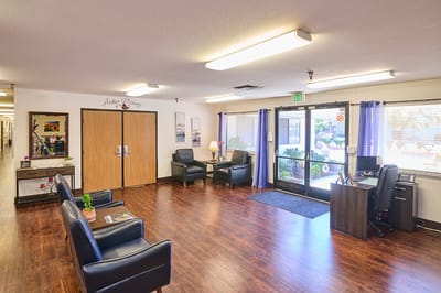 Welcoming common area in Arbor Place with seating and decor