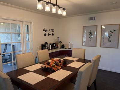Dining area with a table and decorative elements