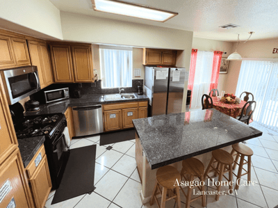 Well-equipped kitchen area with dining table.