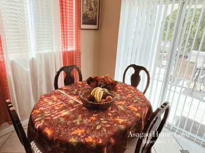 Dining area with a fruit basket on the table