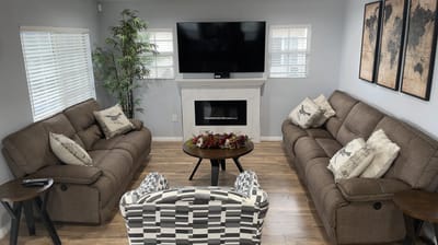 Cozy common area with seating and decorative elements