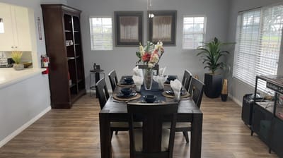 Bright dining room setup with table and decor